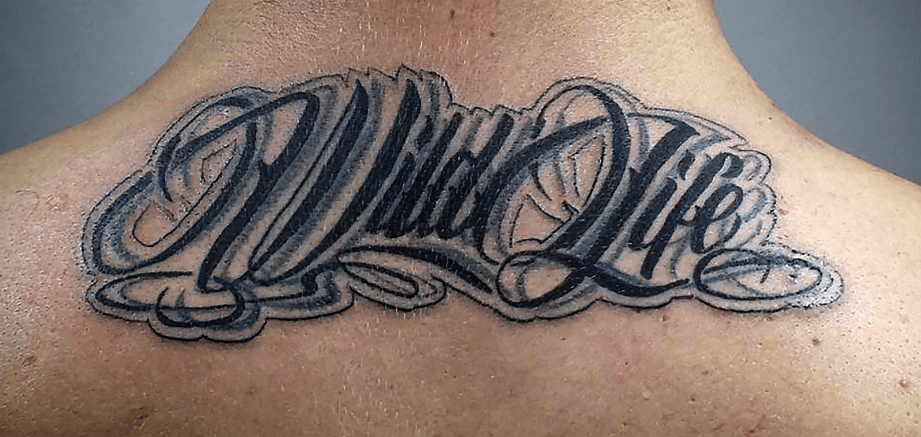 Wild Life lettering Tattoo