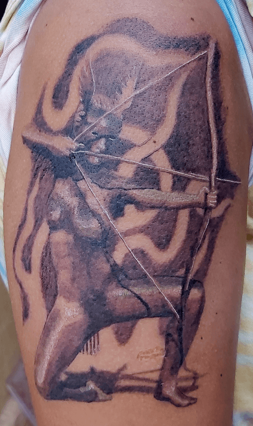 Archer Fire background Tattoo arm