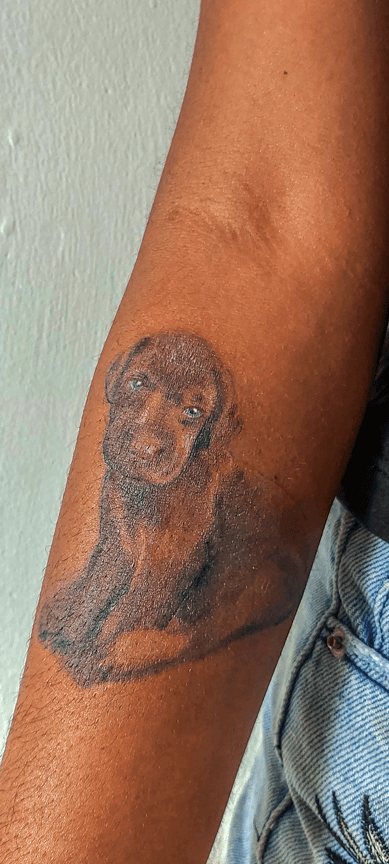 Little Realistic Dog Tattoo